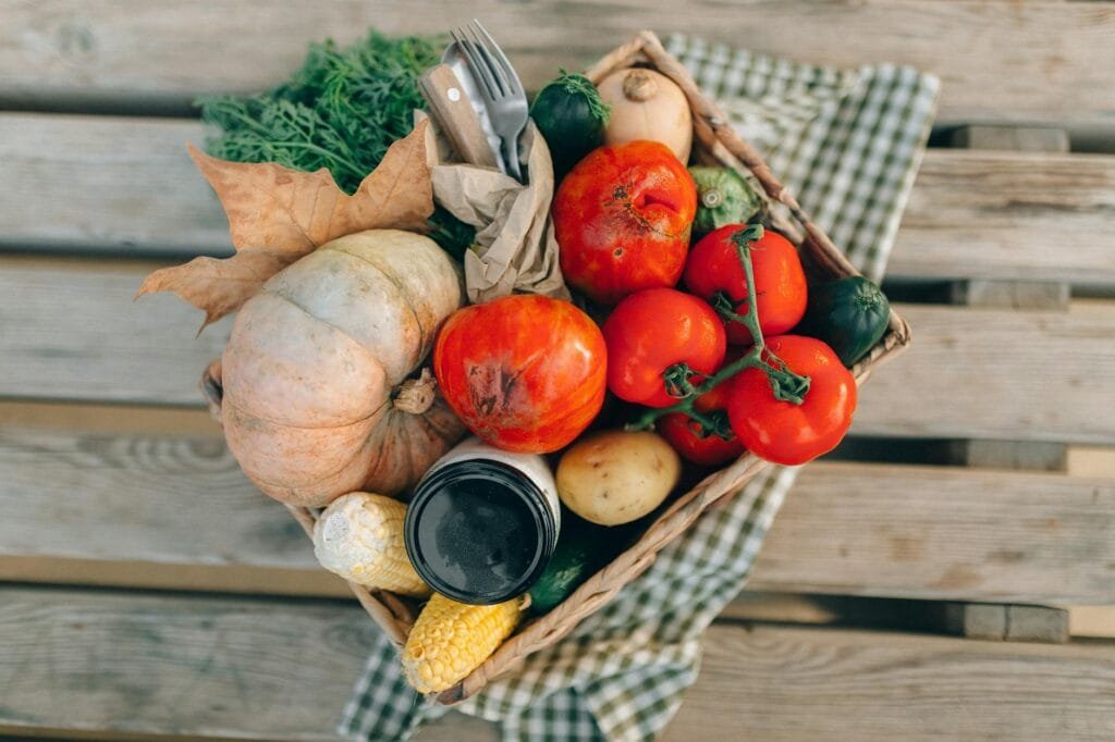 A basket of freshly harvested vegetables